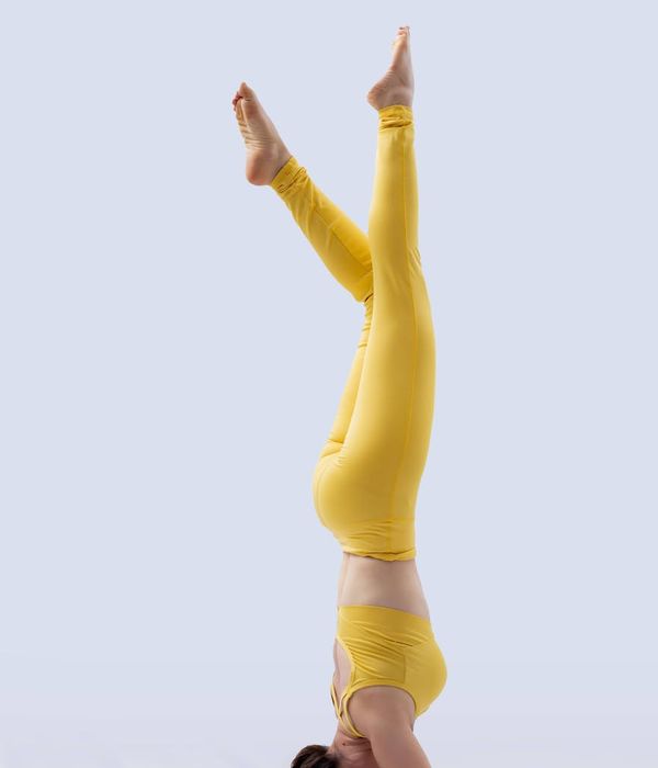 Woman practicing mindful yoga movements for core stability and inner balance